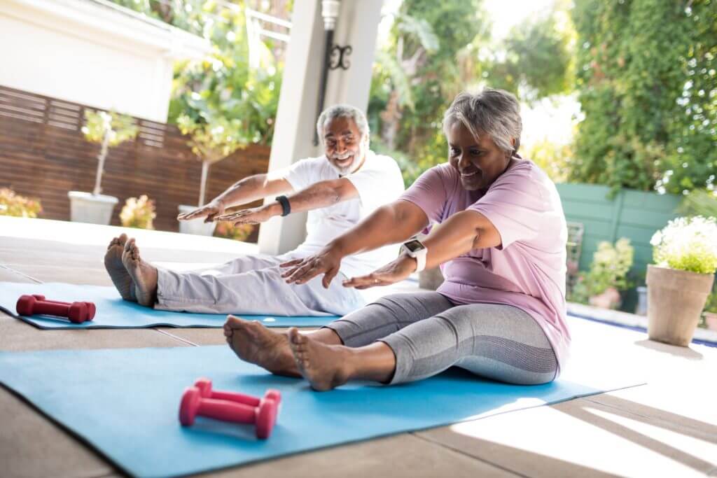 senior couple exercising with dementia