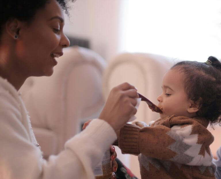 pediatric feeding therapist working with child on new foods